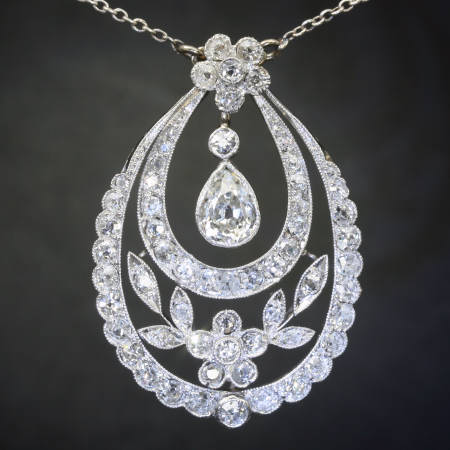 Platinum Edwardian diamond pendant in garland style with pear shape diamond