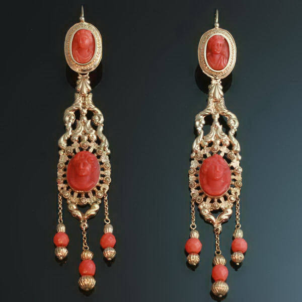 Antique jewelry with the color red up to $7,500