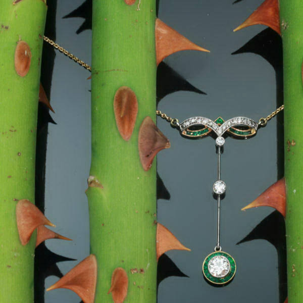 beautiful art deco diamond emerald pendant