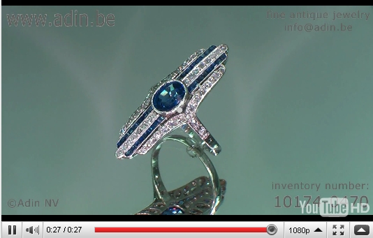 Movie of Stunning platinum Art deco engagement ring with diamonds and sapphires