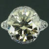 Extravagant estate engagement ring with one 6 crt bulky stone