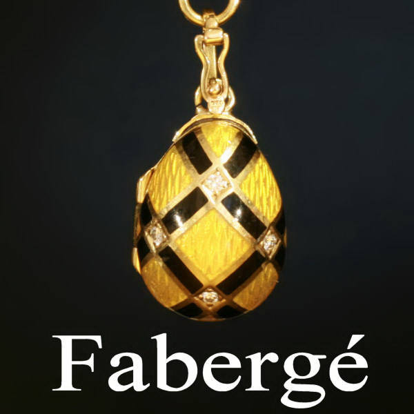 Signed and numbered Faberge gold enameled egg pendant with diamonds