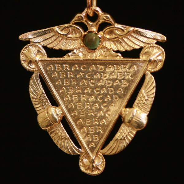 Victorian pendant in neo-Egyptian style with esoteric abracadabra text by Victor Hugo
