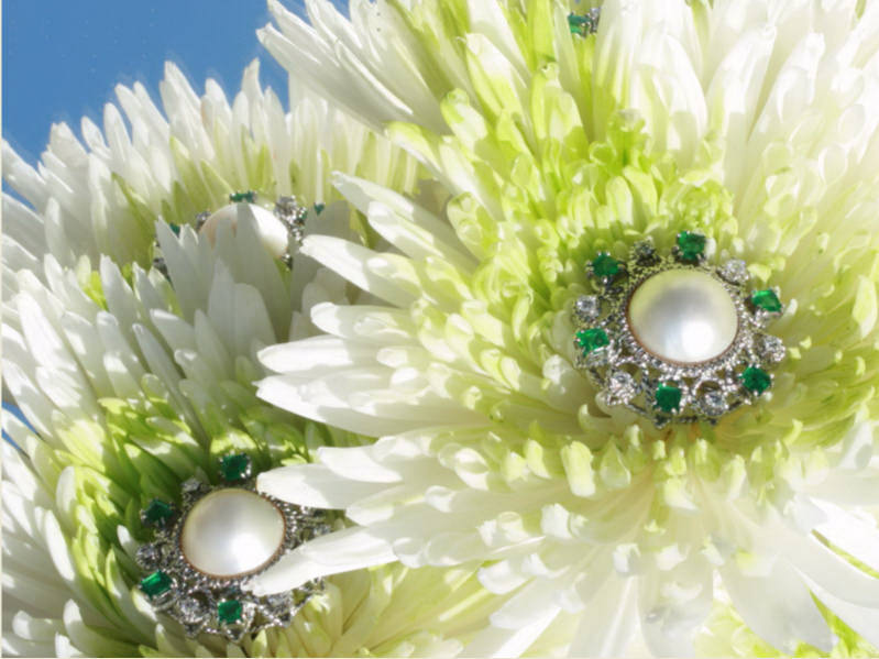 Impressive white gold earclips with diamonds, emeralds and big blister pearls from the antique jewelry collection of Adin Antique Jewelry, Antwerp, Belgium