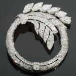 Truly magnificent Art Deco platinum diamond brooch from the antique jewelry collection of www.adin.be