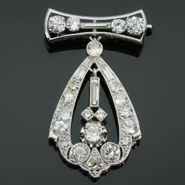 Rich estate art deco diamond pin brooch with diamond pendant hanging down from the antique jewelry collection of www.adin.be