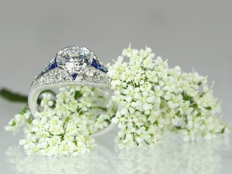 Click the picture to get to see this stunning platinum Art Deco engagement ring with top brilliant and sapphires
