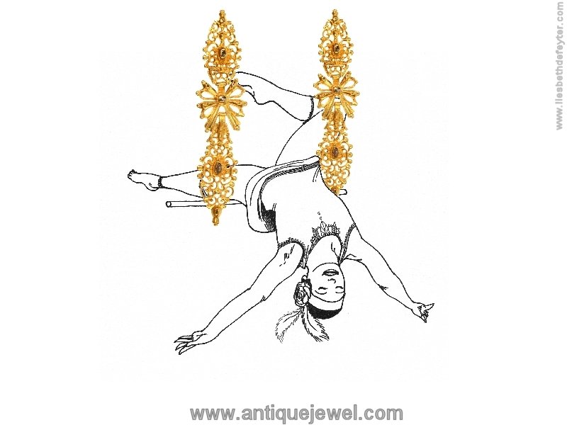 Click the picture to get to see these Antique Portuguese long pendent earrings with rose cut diamonds high carat gold.