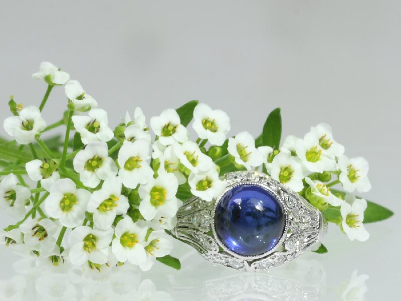 Click the picture to get to see this charming vintage engagement ring with diamonds and sapphire
