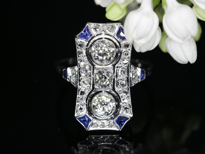 Click the picture to get to see this Typical Art Deco platinum diamond engagement ring.