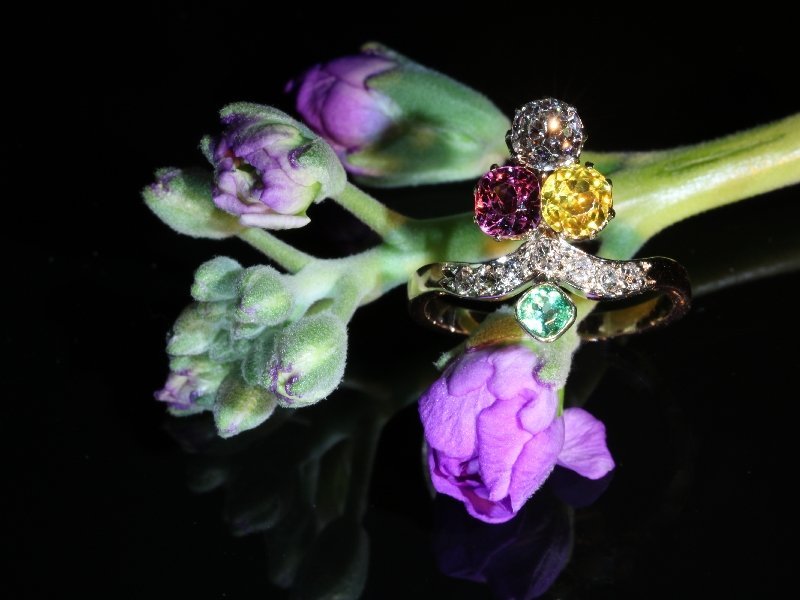 Click the picture to get to see this Antique ring typical so-called Suffragette diamond ring with precious stones.