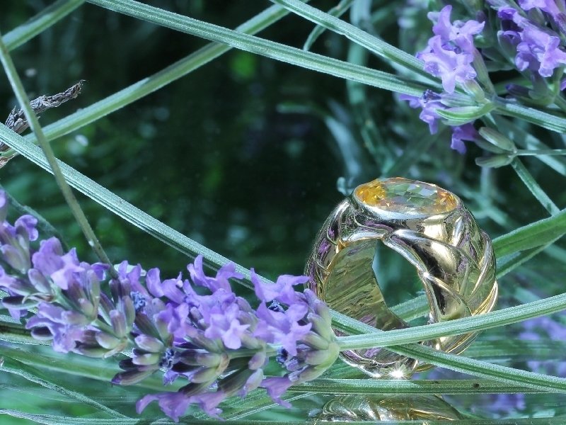Click the picture to get to see this Signed JAR ring with 10+crt yellow sapphire.