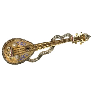 Antique jewelry with music theme