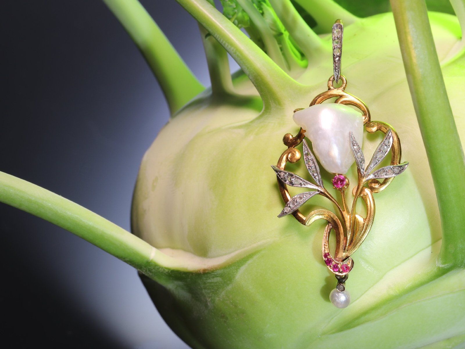 Click the picture to get to see this French Art Nouveau pendant with big Mississippi dog tooth pearl diamonds rubies.