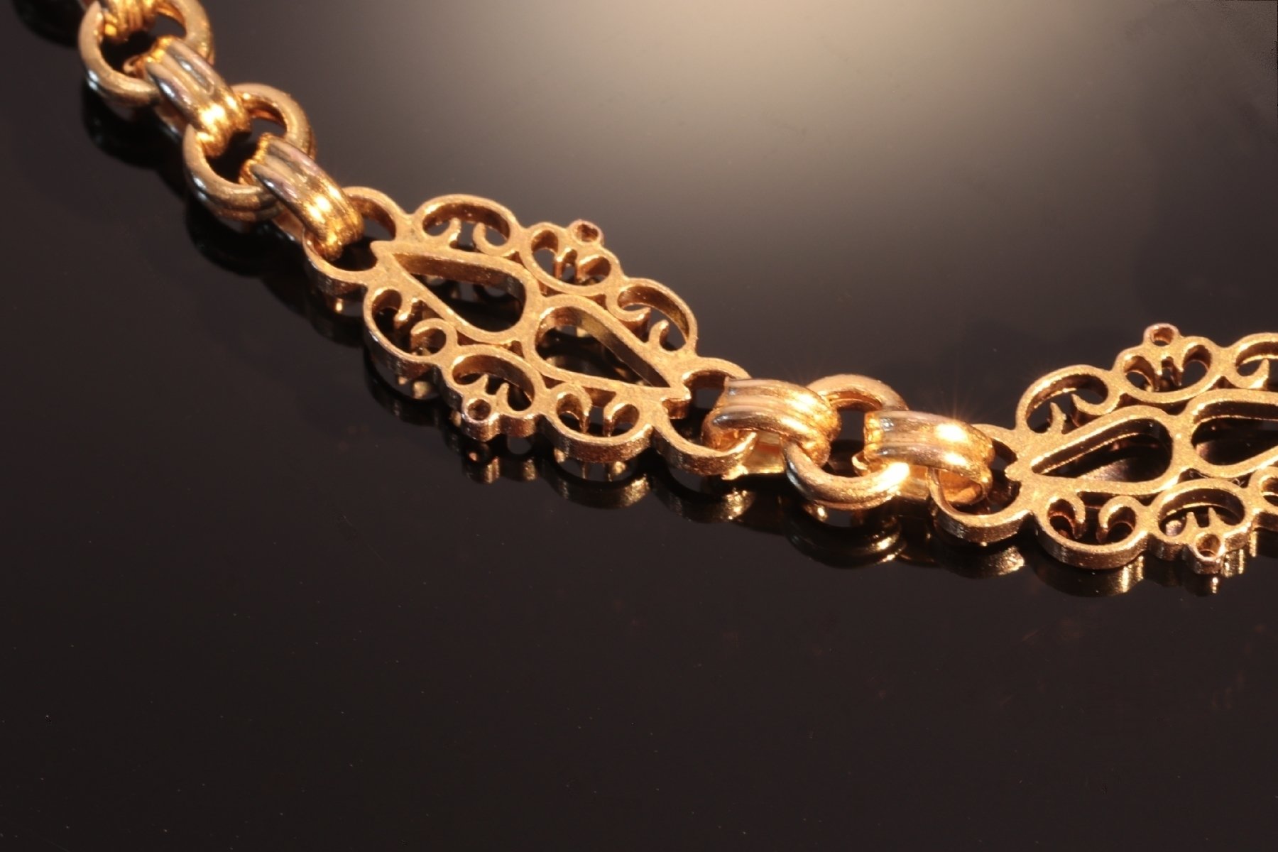 Click the picture to get to see this Antique Victorian long gold chain.