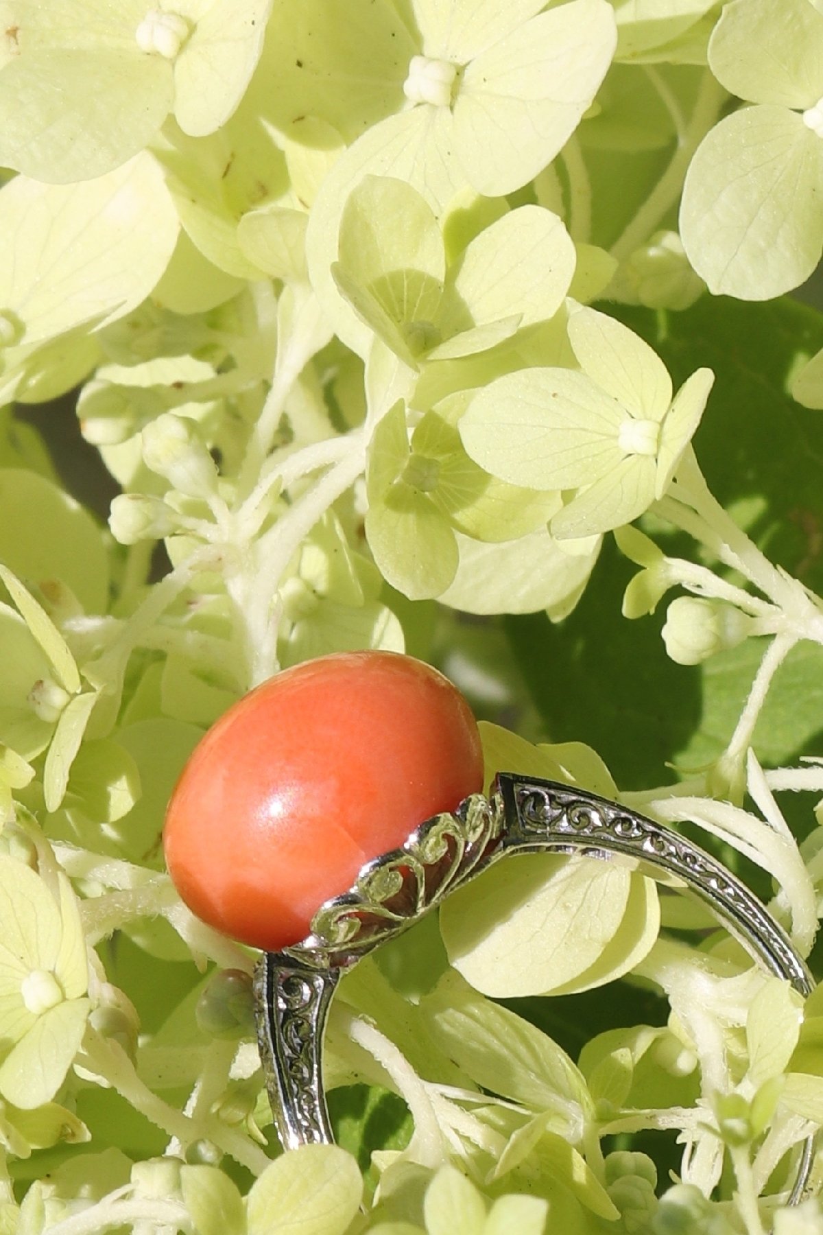 Click the picture to get to see this Typical platinum Art Deco diamond ring with coral.