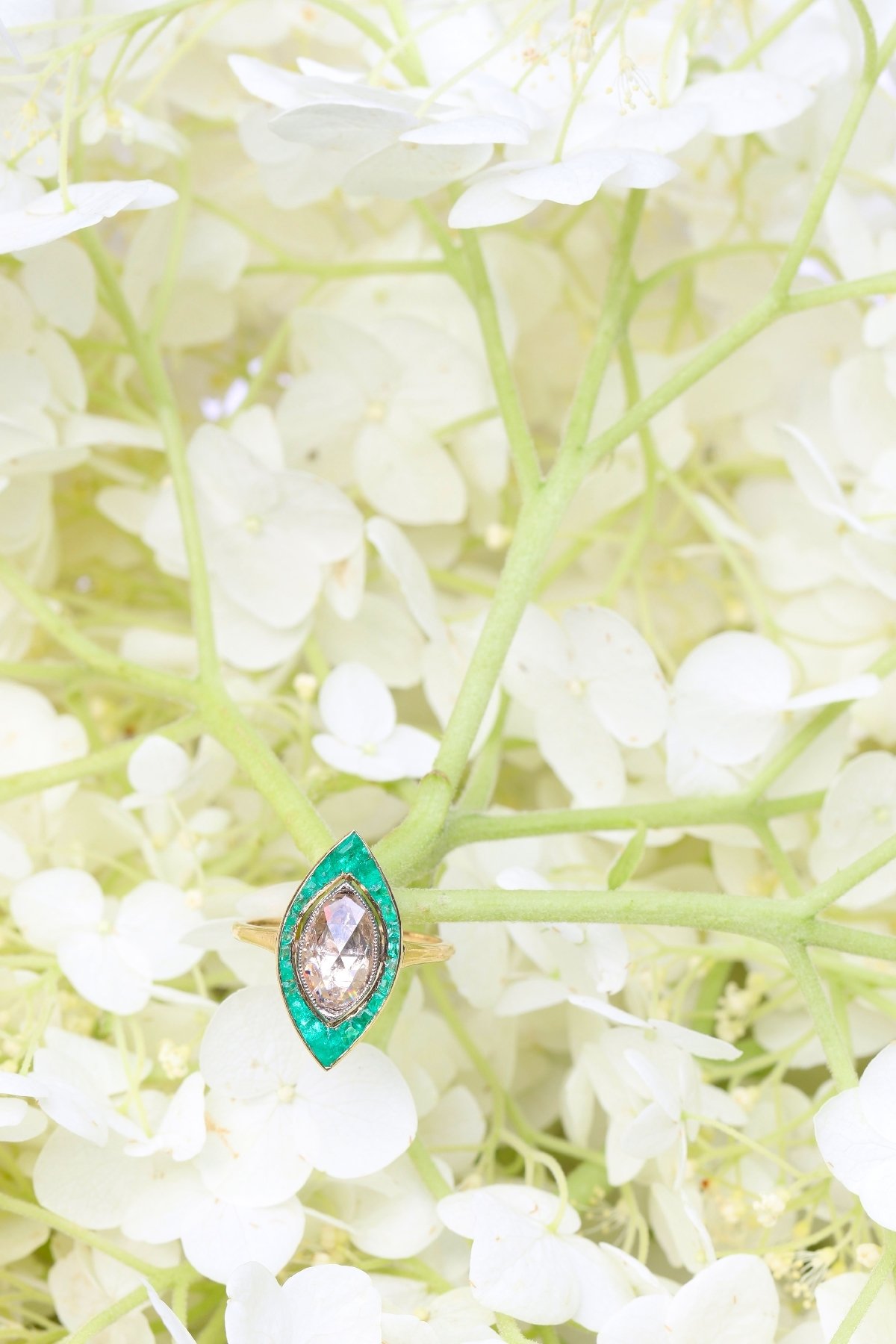 Click the picture to get to see this Art Deco Vintage engagement ring large marquise rose cut diamond and emeralds.