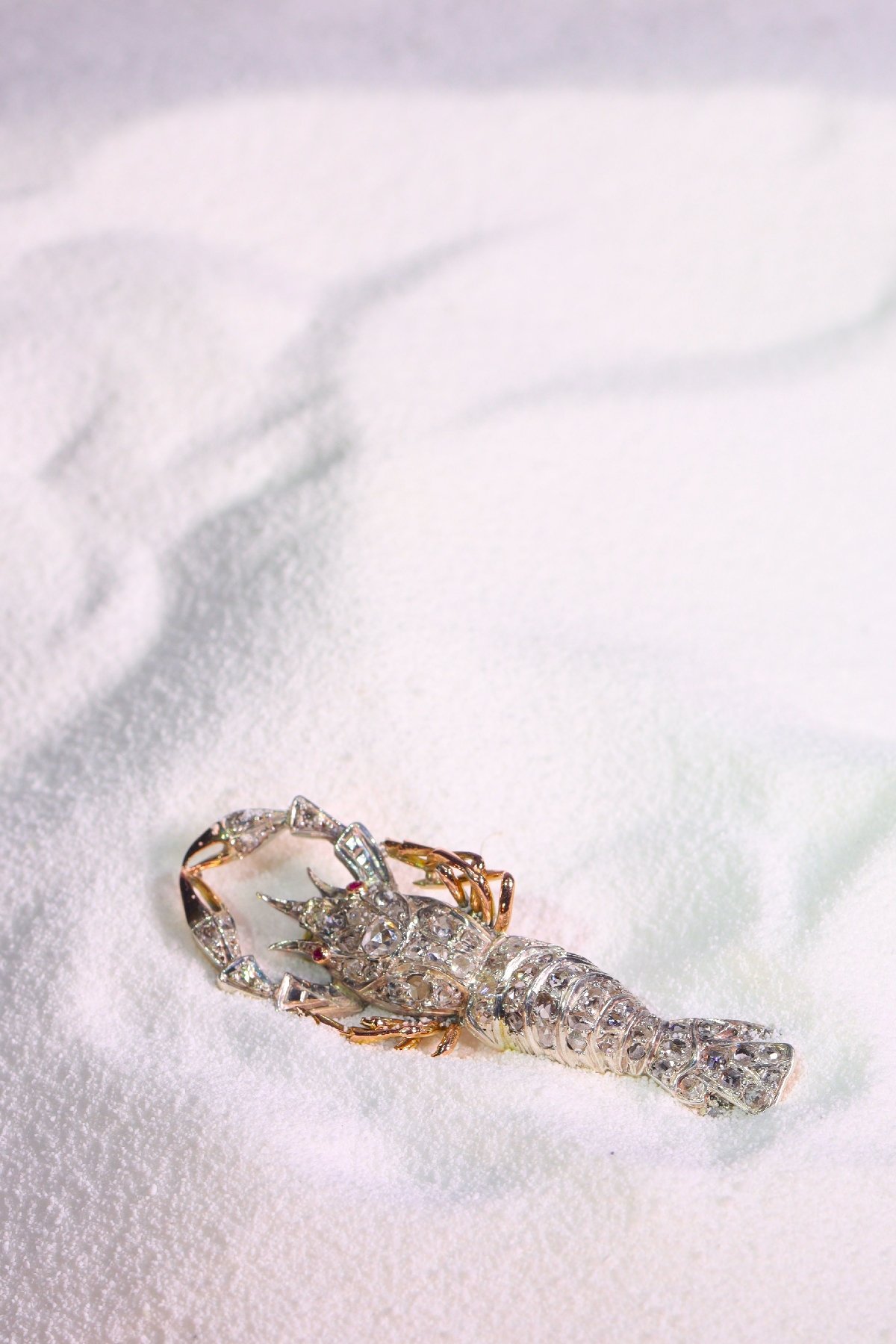 Click the picture to get to see this Antique gold and silver crayfish brooch fully embelished with rose cut diamonds